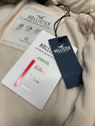 Abrigo plumífero largo beige Hollister
