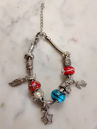 Pulsera Charm Estrellas y Plumas