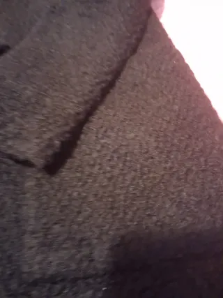 Abrigo negro con cremallera