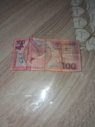 Billete 100 de Surinam monedas antigua