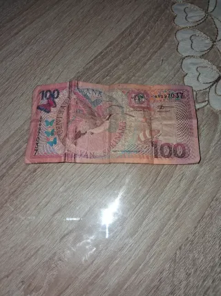 Billete 100 de Surinam monedas antigua