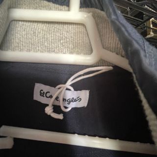 Chaqueta acolchada con mangas de punto azul marino