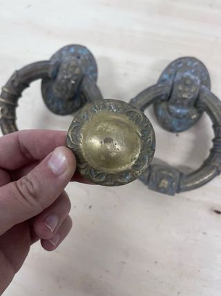 Pareja llamadores de bronce antiguos