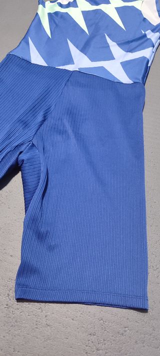 Mono Nike atletismo azul y verde elite