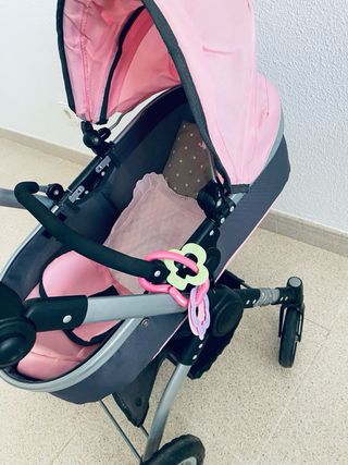 Cochecito muñecas tipo Bugaboo rosa