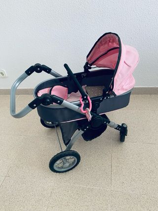 Cochecito muñecas tipo Bugaboo rosa