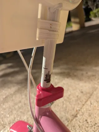 Bicicleta infantil rosa con cesta