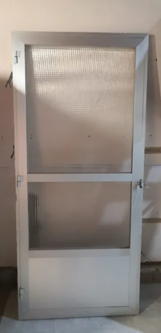 Puerta de aluminio con cristal