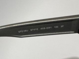 Gafas de sol Prada negras y grises