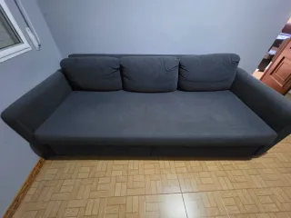 Sofá-cama gris de tela