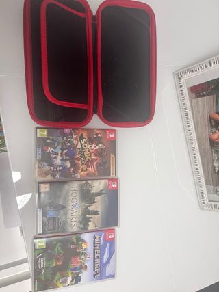 Nintendo Switch con 4 mandos y 3 juegos
