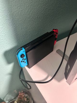 Nintendo Switch con 4 mandos y 3 juegos