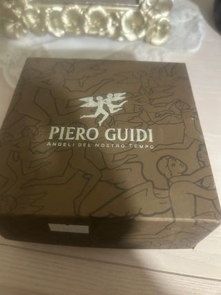 Cintura con fibbia dorata e stampa