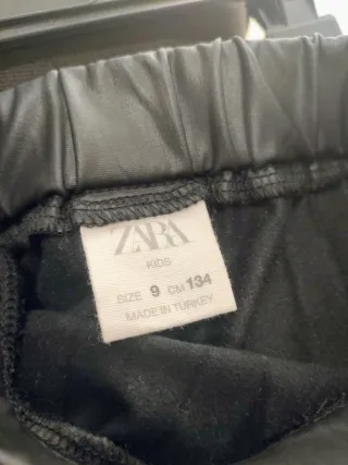 Minifalda polipiel niña negra plisada Talla 9 años