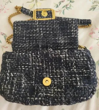 Bolso de Mango negro y dorado