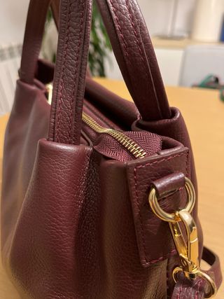 Bolso de piel burdeos sin usar