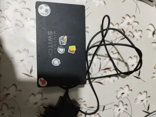 Nintendo Switch Roja y Negra con Juegos