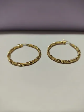 Aros retorcidos oro 18k
