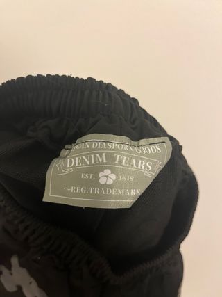 pantalón denim tears