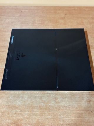 PS4 Fat con Scatola, 2 Controller e 7 Giochi