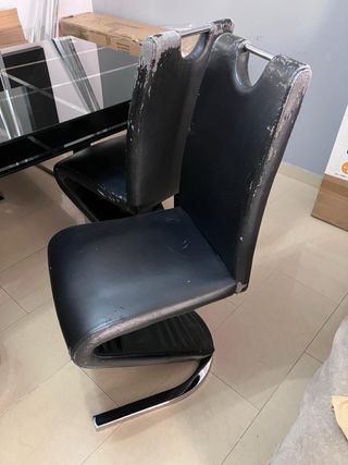 Mesa de comedor y 6 sillas negras