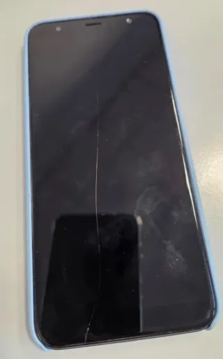 Smartphone Samsung Galaxy J6+ in nero con custodia e accessori