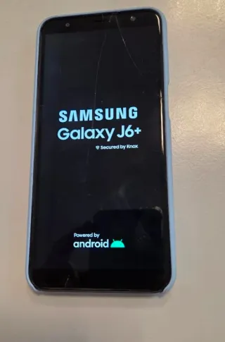 Smartphone Samsung Galaxy J6+ in nero con custodia e accessori