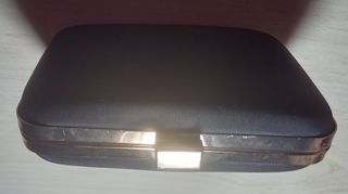 Bolso cartera Hugo Boss negro y dorado