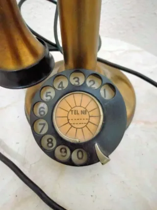 Teléfono antiguo candelabro
