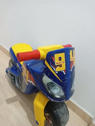 Cochecito infantil con volante,moto y ciervito