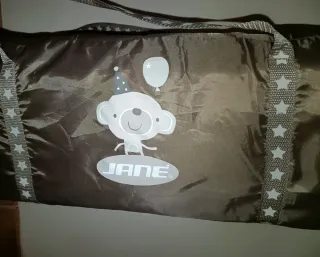 Cama portátil Jané con ruedas, colchón, bolsa.