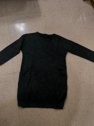 Vestido con manga larga.