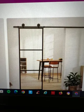 Puerta corredera de cristal y metal