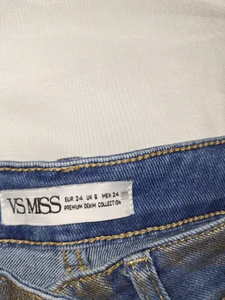 Pantalón señora azul con detalles dorados