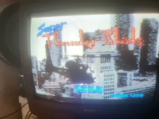 Sega Mega Drive con mando y juegos