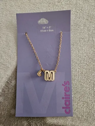 Colgante Claire's letra M y corazón dorado