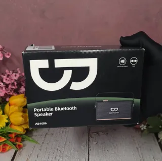 Altavoz Portátil GOOJODOQ Verde y Dorado