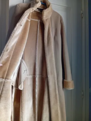 Abrigo mujer piel vuelta