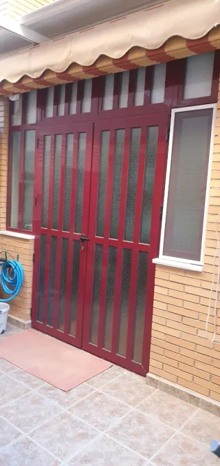 Puerta doble aluminio y cristal 2.10x1.50