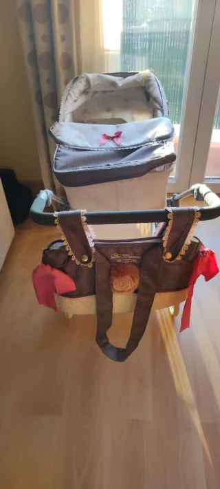 Carro de bebé con accesorios