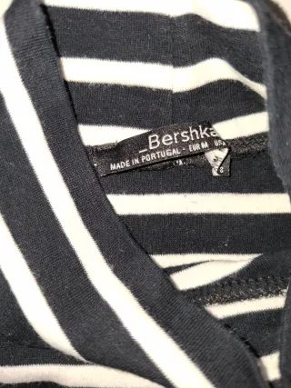 Camiseta de rayas cuello alto