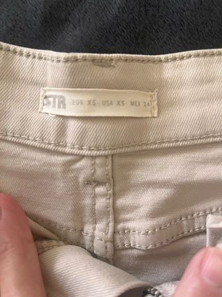 Mini falda beige talla 34