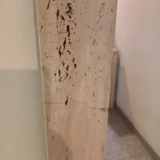 Espejo de pared con detalle mármol