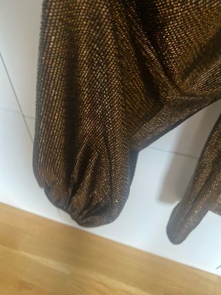 Blusa dorada brillante fiesta