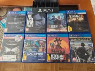 Lote 8 Videojuegos PS4 más soporte para colocarlos
