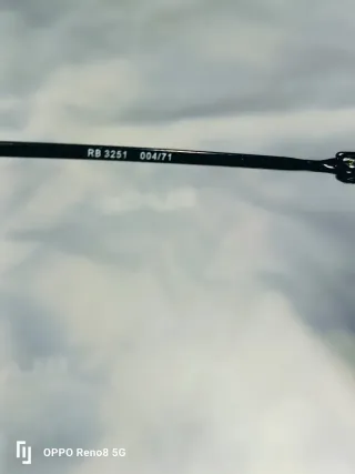 Occhiali da sole Ray-Ban neri e verdi