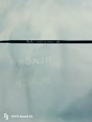 Occhiali da sole Ray-Ban neri e verdi