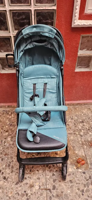 Silla de paseo ligera color turquesa