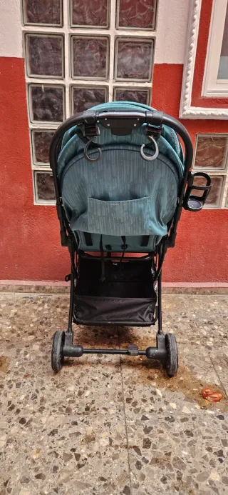 Silla de paseo ligera color turquesa