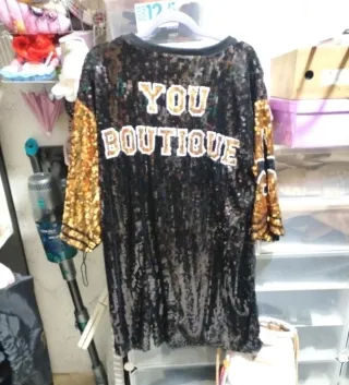 Vestido lentejuelas negro y dorado